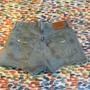 Vintage distressed Levi’s 501 cutoff denim shorts